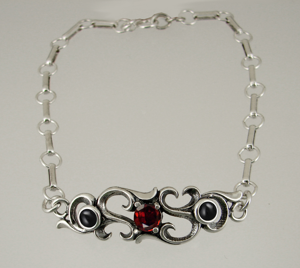 Sterling Silver Bracelet With Faceted Garnet And Black Onyx